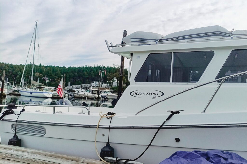 Ocean Sport boat tied to a dock.